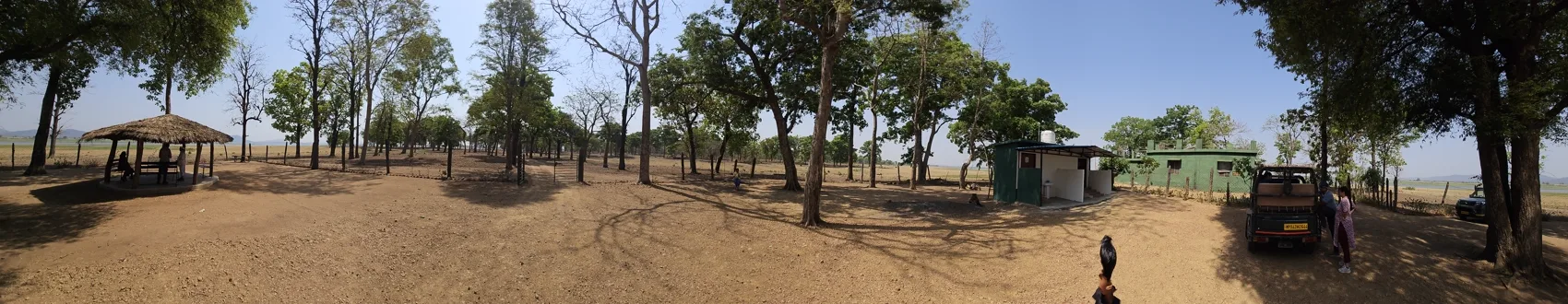 The designated forest rest stop deep in Churna — a gazebo, huts and shade