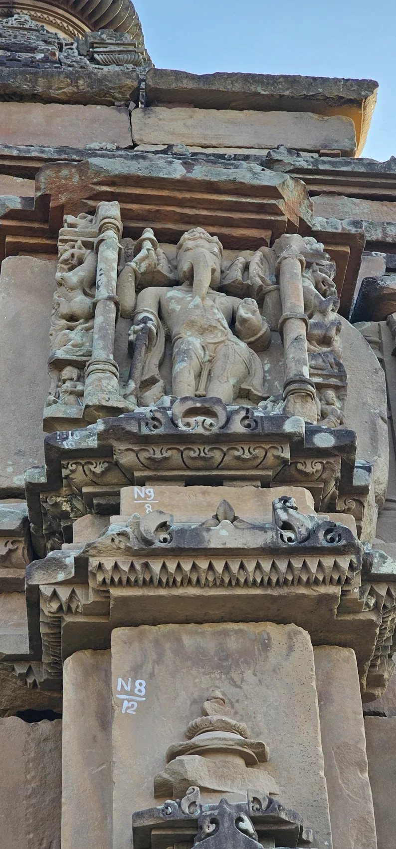 Sculpted figures on the wall of the Bajramath temple