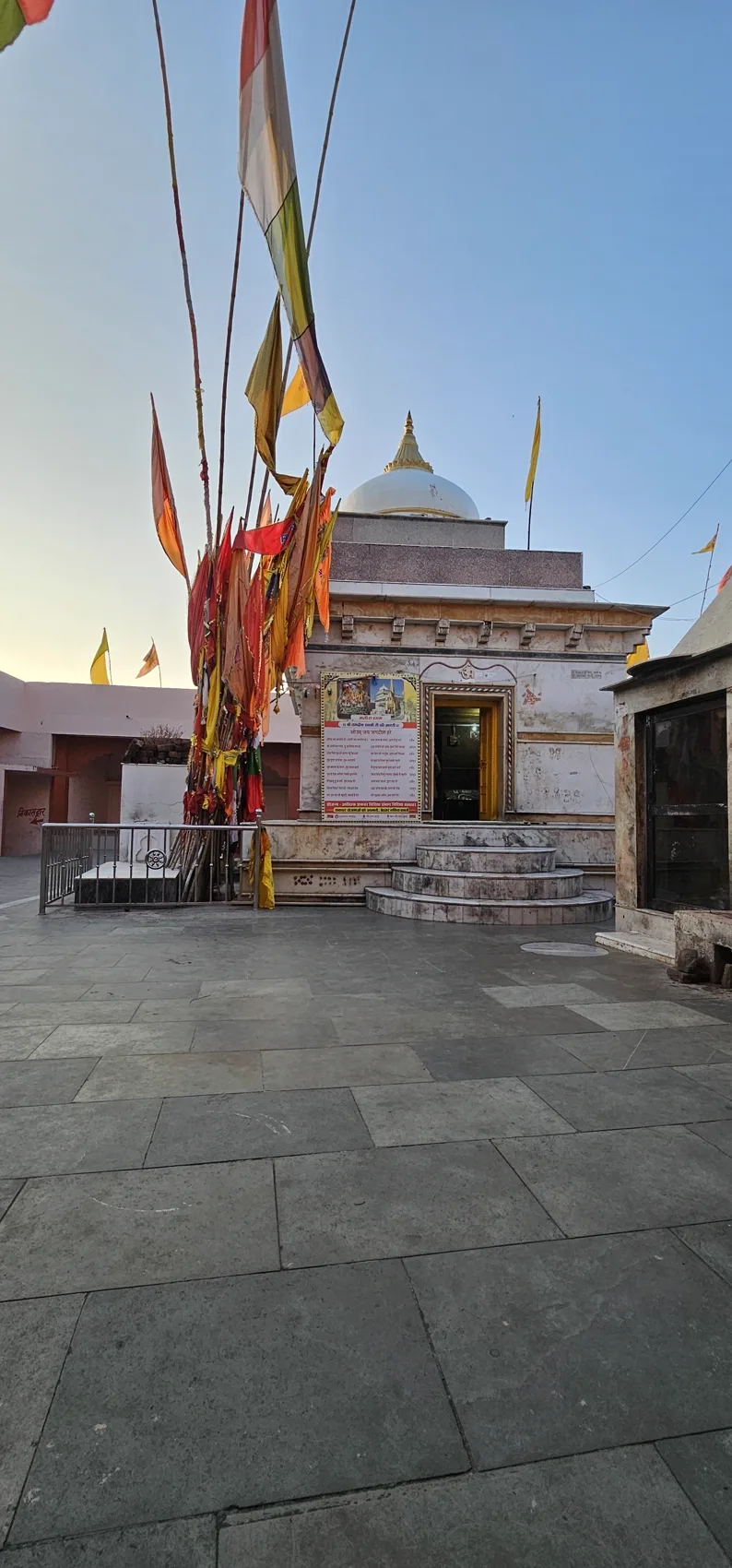 The living Jagdish Swami temple at Gyaraspur, prayer flags flying