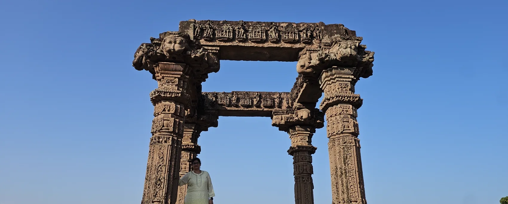 The 10th-century Hindola Torana gateway against a clear sky