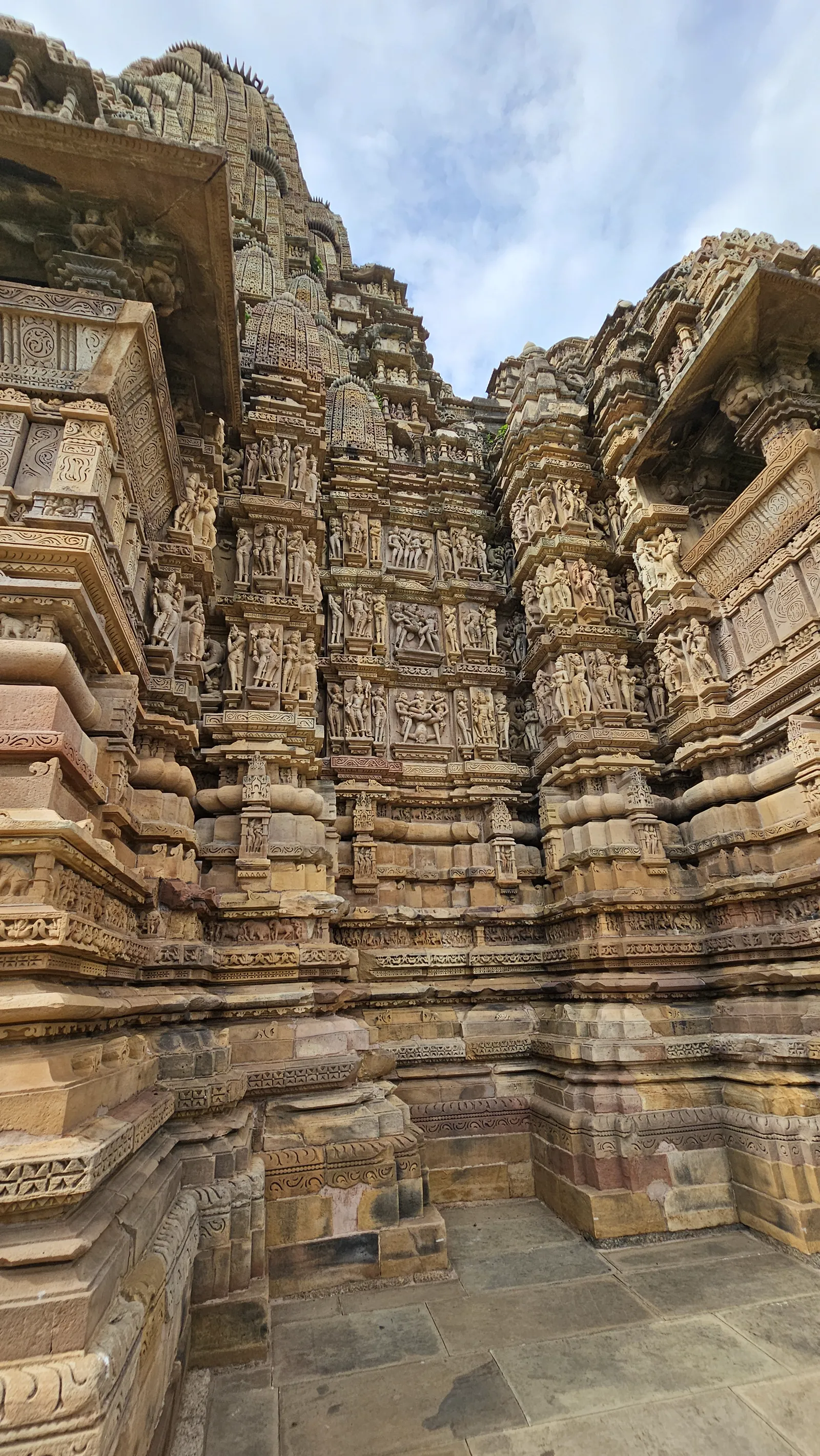 A band of carved apsara sculptures on the temple wall