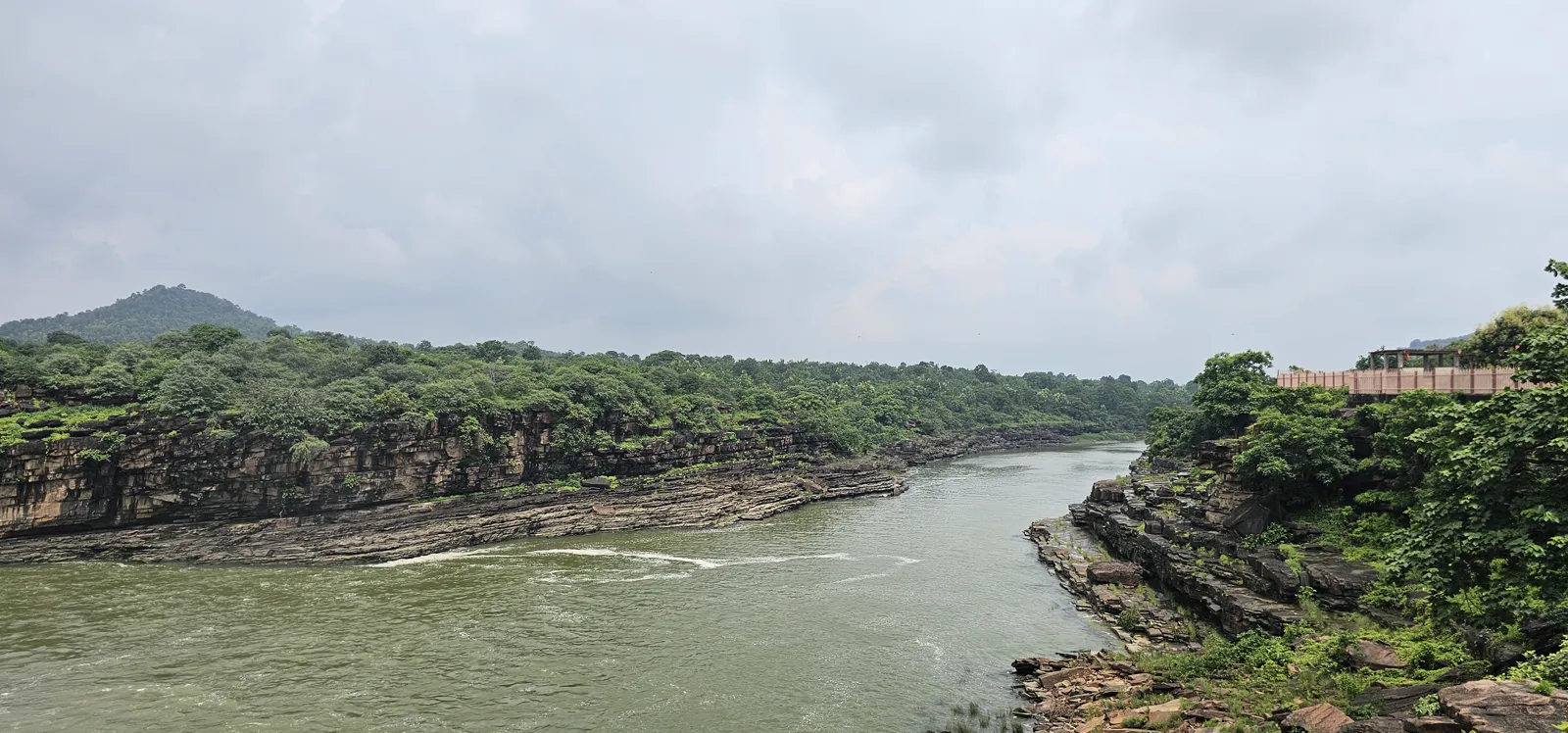 The misty gorge below Rahatgarh waterfall, spray rising from the churning Bina river