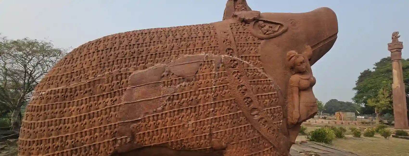 The colossal Gupta-era stone boar (Varaha) of Eran, its body covered in tiny figures