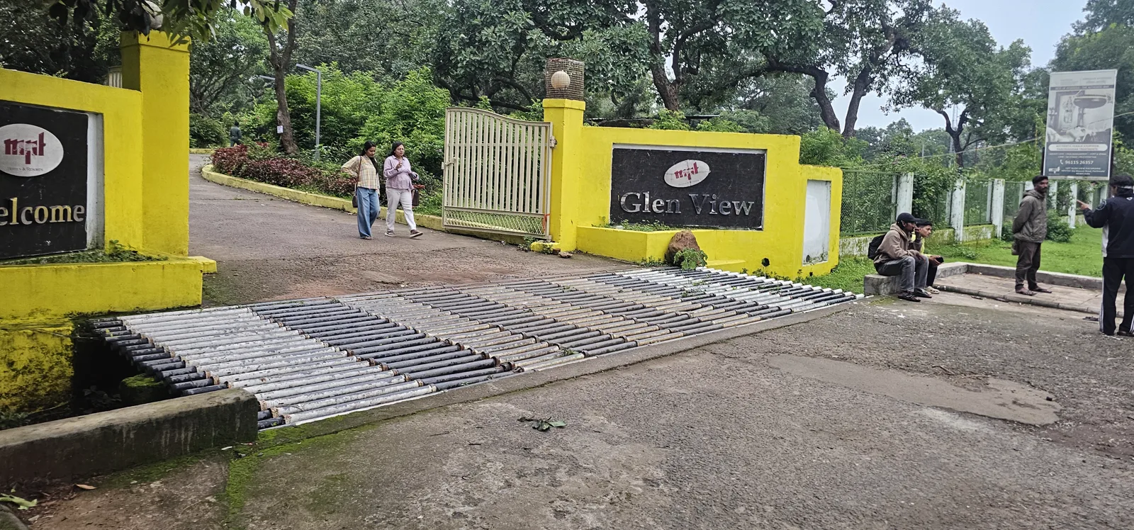 The yellow welcome gate of MPT Glen View, Pachmarhi, venue of the Pachmarhi Monsoon Marathon, on race morning